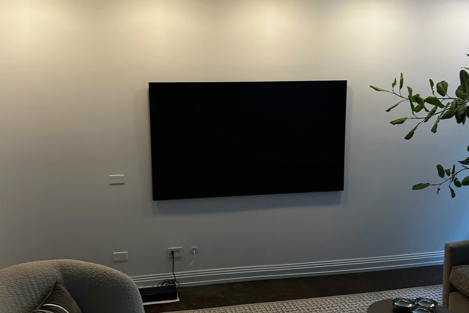 Wall-mounted television in a living room